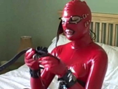 Latex Model Prepares For Work